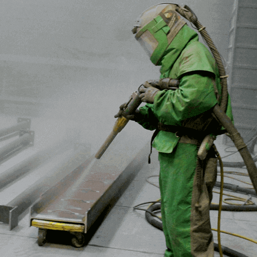 Surface preparation for industrial painting services in Dammam